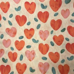 Bomulds stof med hjerter p sandfarvet baggrund - pr. 0,25 m