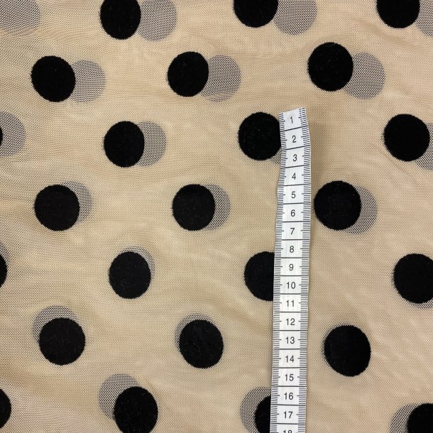 Polkaprikket chiffon i beige og sort