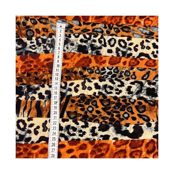 Polyester med leopardprint i flere farver pr. 0,25 m.