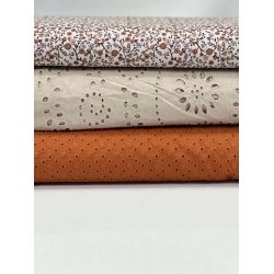 Fast bomuld med broderi i brun/orange pr 0,25 m