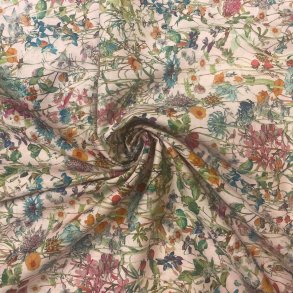 Liberty bomuld med vilde blomster p� lyser�d baggrund pr. 0,25 m.