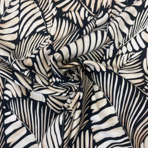 Viskosestof med blade i beige p sort baggrund pr. 0,25 m