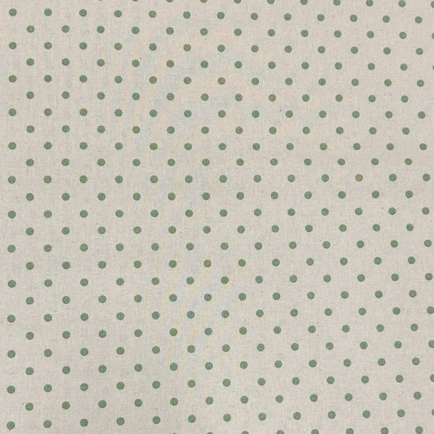 Fast bomuldsstof i lys beige med prikker i lys grn - pr. 0,25 meter 