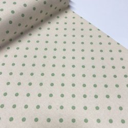 Fast bomuldsstof i lys beige med prikker i lys grn - pr. 0,25 meter 