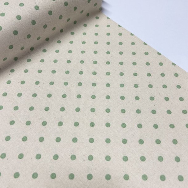 Fast bomuldsstof i lys beige med prikker i lys grn - pr. 0,25 meter 