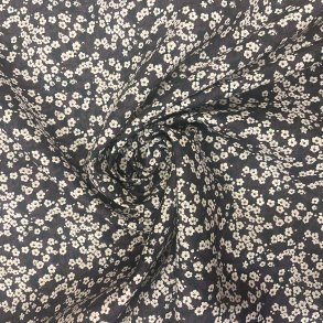 Liberty bomuld med blomster p� m�rkebl� baggrund pr 0,25 m.