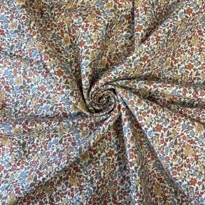 Liberty Stof med sm� blomster i karrygul, orange, bl� og gr�n p� hvid baggrund pr 0,25 m