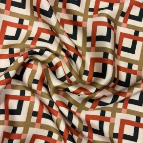 Stof med grafisk mnster pr 0,25 m.