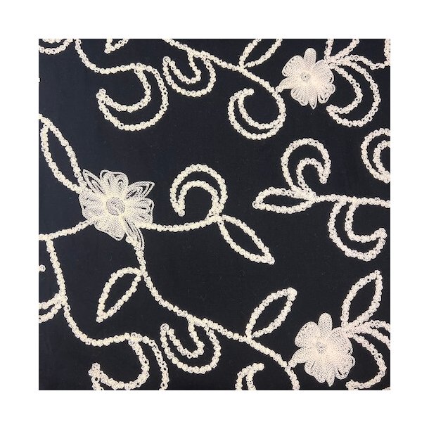 Bomuld med broderi pr 0,25 m