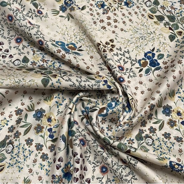 Beige polyester med sm blomster - pr. 0,25 meter