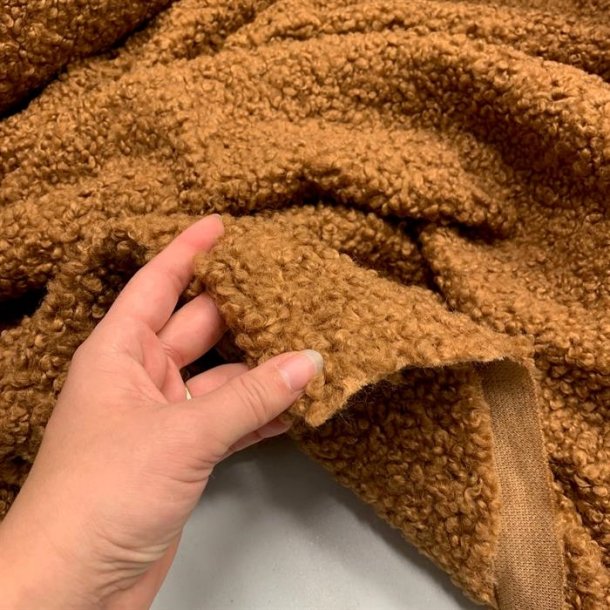 Bld boucl i gyldenbrun - pr. 0,25 meter