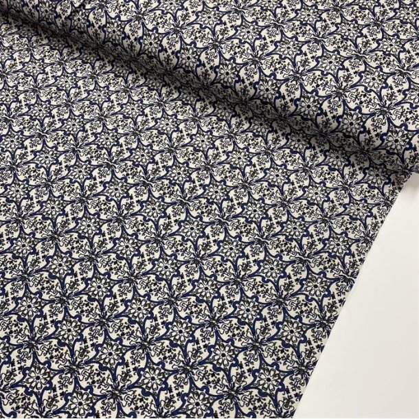 Bomuld med symmetrisk, blt mnster - pr. 0,25 meter 