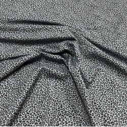 OEKO-TEX bomuldsjersey i bl med sorte leopardpletter - pr. 0,25 meter.