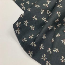 Bomuldslrred i koksgr med smt blomsterprint - pr. 0,25 meter