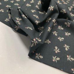 Bomuldslrred i koksgr med smt blomsterprint - pr. 0,25 meter