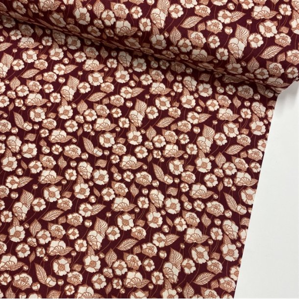 Bomuldspoplin i mrkerd med lyse blomster - pr. 0,25 meter