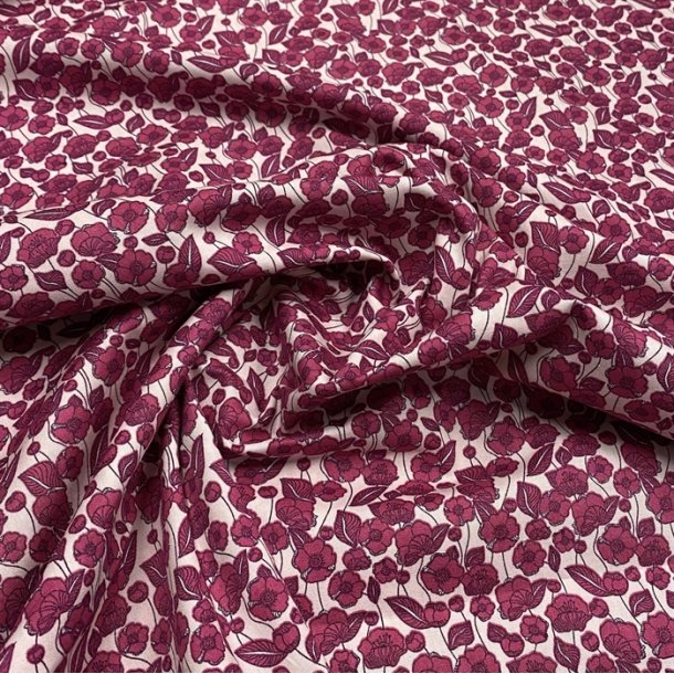 Bomuldspoplin i sart rosa med mrkrosa blomster - pr. 0,25 meter