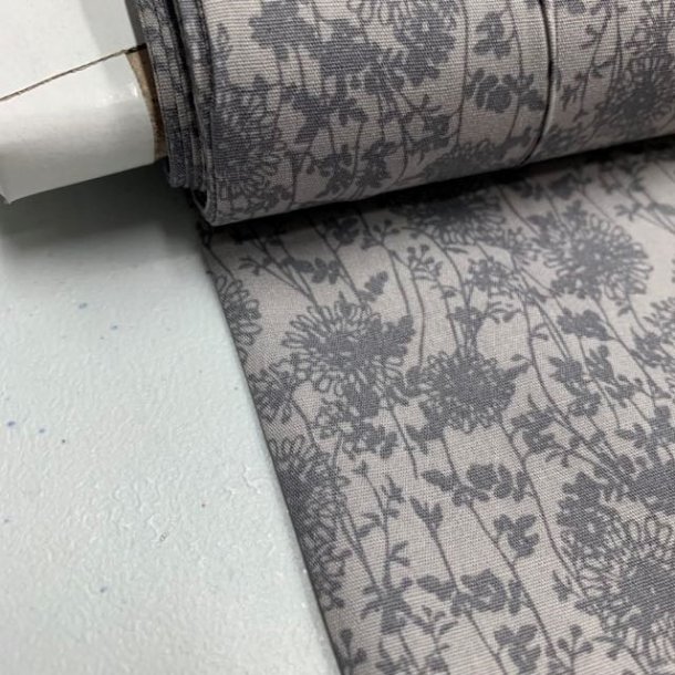 Bomuldspoplin i lysegr med blomster - pr. 0,25 meter