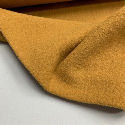 Boucl uld i karrygul - pr. 0,25 meter