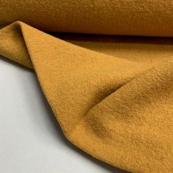 Boucl uld i karrygul - pr. 0,25 meter