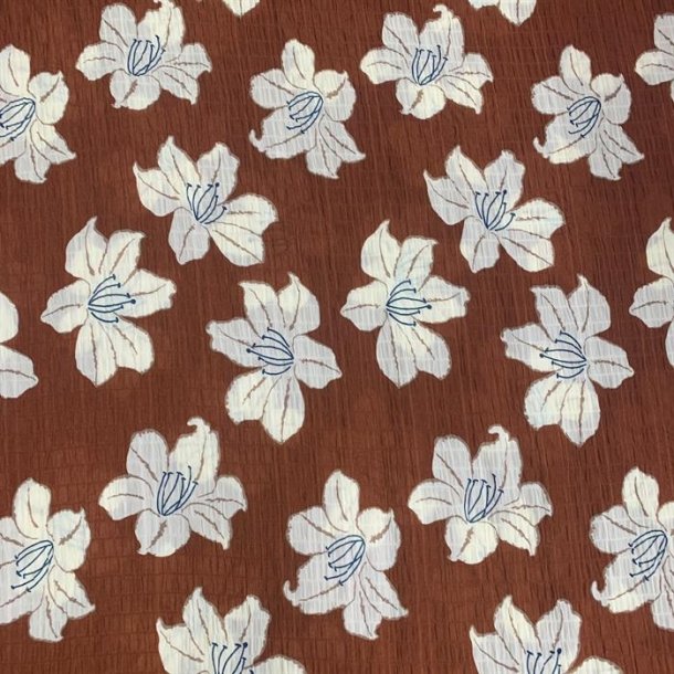 Brun polyester kvalitet med blomster og seersucker look - pr. 0,25 meter