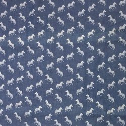 Chambray i jeansbl farve med sm hvide zebraer - pr. 0,25 meter