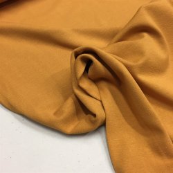 Den lkre viskose jersey i karrygul fv. 17 - pr. 0,25 meter