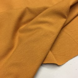 Den lkre viskose jersey i karrygul fv. 17 - pr. 0,25 meter