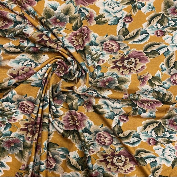 Italiensk viskosejersey i gul med blomster - pr. 0,25 meter
