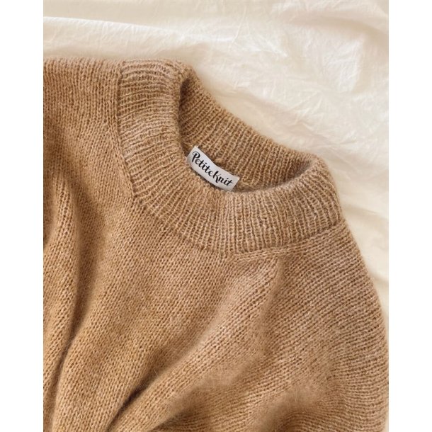 "Keep Your Knit In Shape" - strikkeelastik