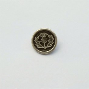 S�lv- og sortfarvet, medaljonagtig metalknap med bladgrene og ananas, 25 mm