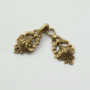 Guldfarvet dobbeltsp�nde med ornamenter, 65 mm