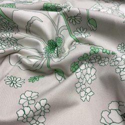 Lysegr bomuld med tegnede grnne blomster - pr. 0,25 meter 