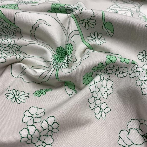 Lysegr bomuld med tegnede grnne blomster - pr. 0,25 meter 