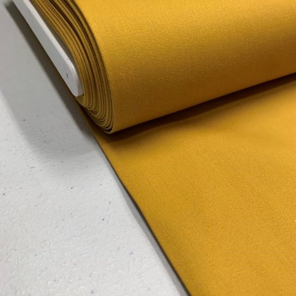 Lrredssatin til bukser i karrygul - pr. 0,25 meter