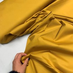 Lrredssatin til bukser i karrygul - pr. 0,25 meter