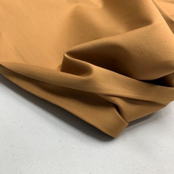 Lrredssatin til bukser i sennep fv 35 - pr. 0,25 meter