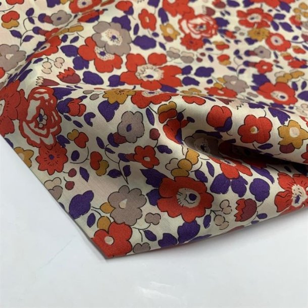 Liberty bomuldslrred 'Betsy Tana Lawn' i rhvid med blomster i rust, lilla og karry 00103 C - pr. 0,25 meter