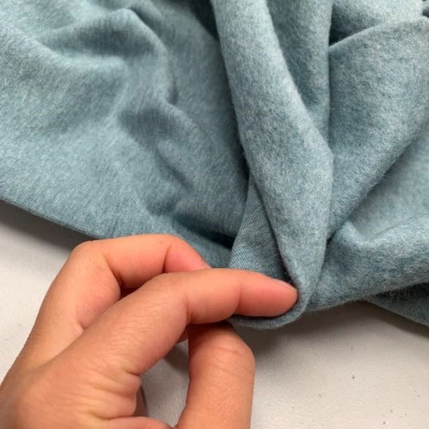 ko-tex isoli med bld bagside i stvet lys turkis fv. 1742 - pr. 0,25 meter