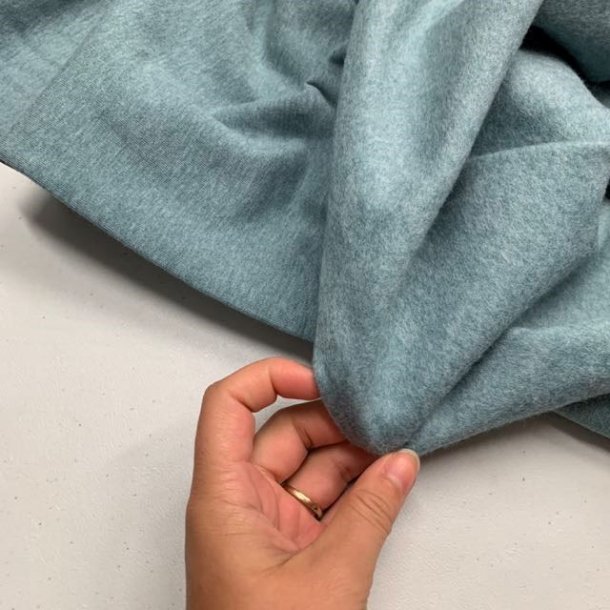 ko-tex isoli med bld bagside i stvet lys turkis fv. 1742 - pr. 0,25 meter