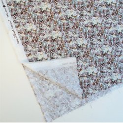 Bomuldslrred med sm fine blomster i dmpede nuancer - pr. 0,25 meter.