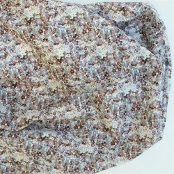 Bomuldslrred med sm fine blomster i dmpede nuancer - pr. 0,25 meter.