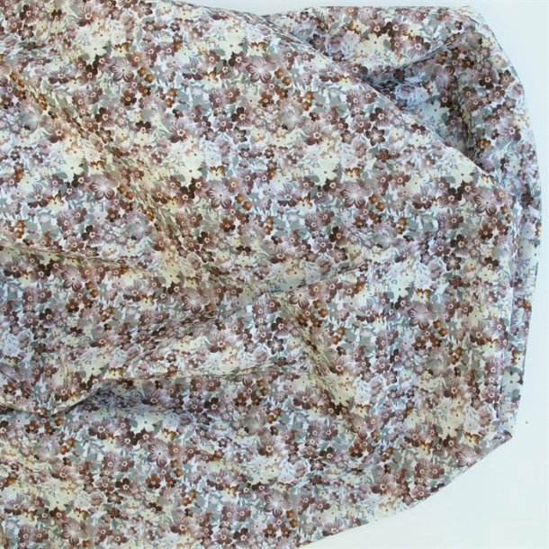 Bomuldslrred med sm fine blomster i dmpede nuancer - pr. 0,25 meter.