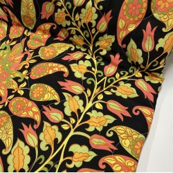 Quiltet polyester med orange paisley mnster - pr. 0,25 meter 