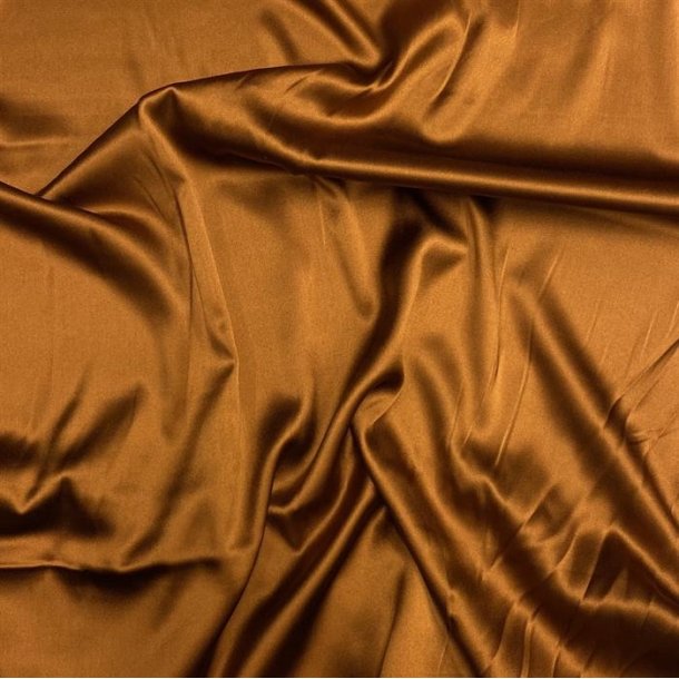Silke med strk i brndt orange - pr. 0,25 meter