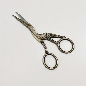 Storkesaks i messingfarve 