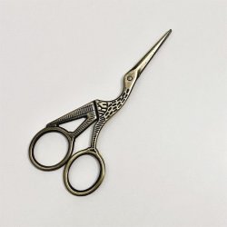 Storkesaks i messingfarve 