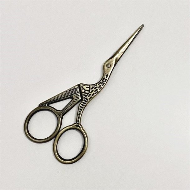 Storkesaks i messingfarve 