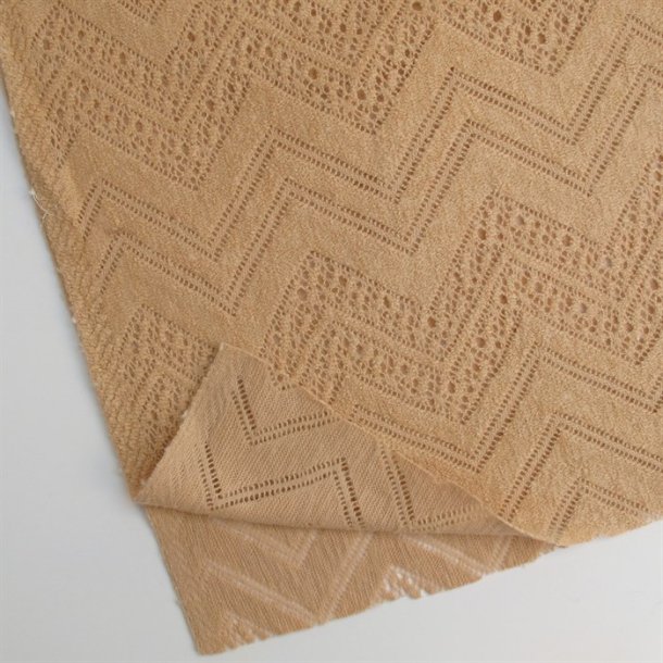 Strikstof med hulmnster i pudderfarvet - pr. 0,25 meter