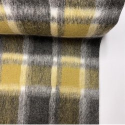 Uldkvalitet med gr og grnlige tern - pr. 0,25 meter